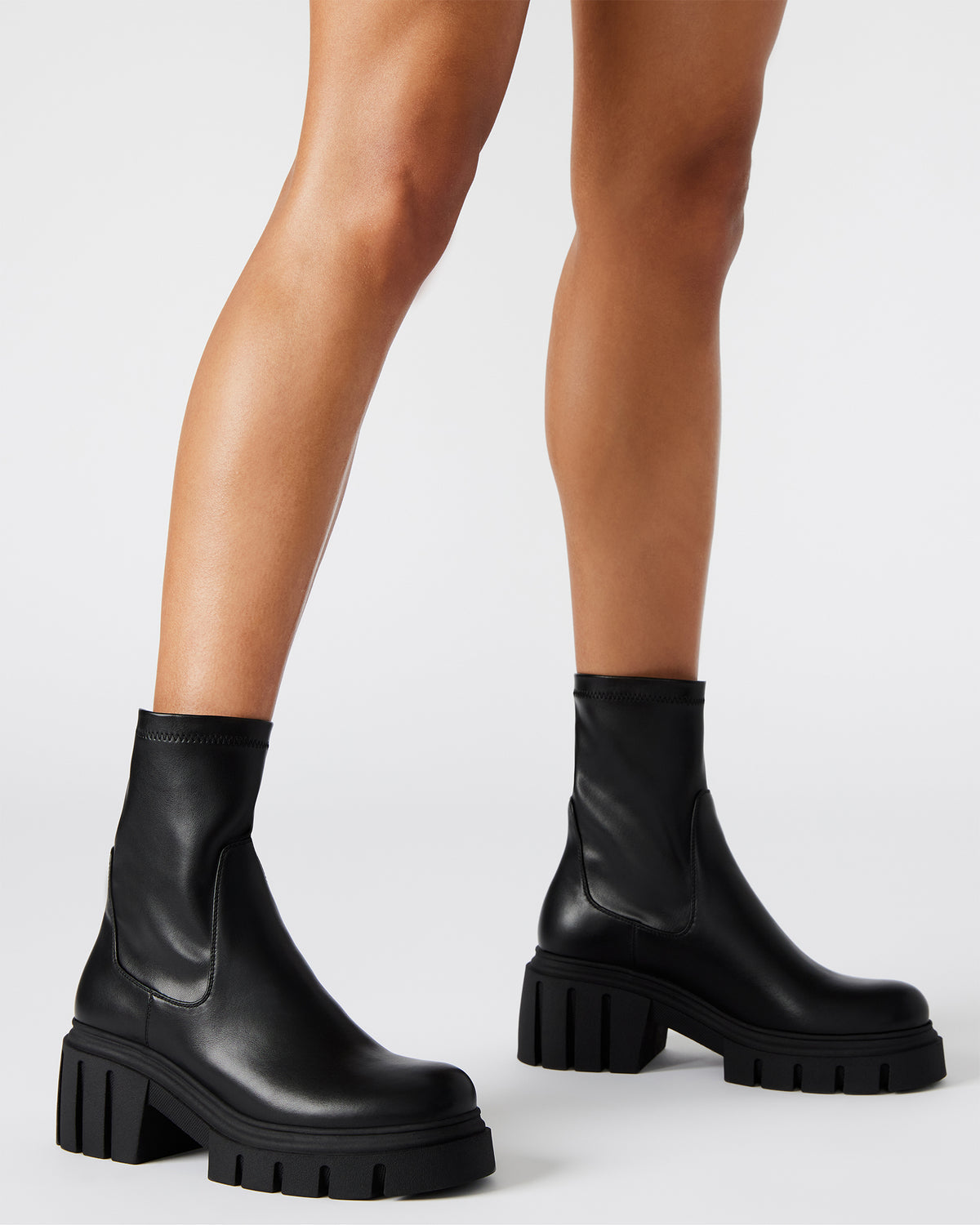 BOOMBA Black Lug Sole Ankle Boot | Women's Booties