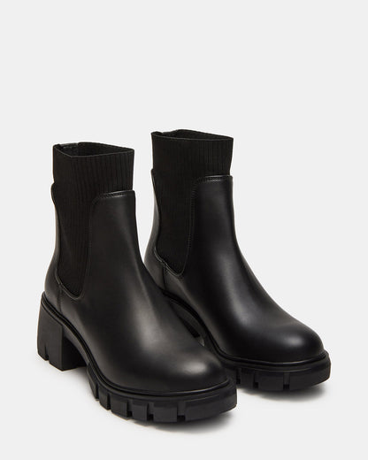 HUTCHH20 Black Water-Resistant Lug Sole Ankle Boot | Women's Booties